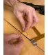 réalisation de nock-set en fil sur une corde d'arc