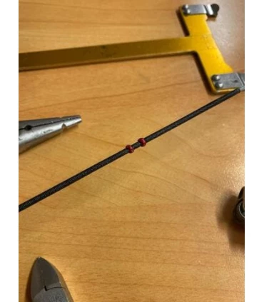 réalisation de nock set en fil sur une corde d'arc
