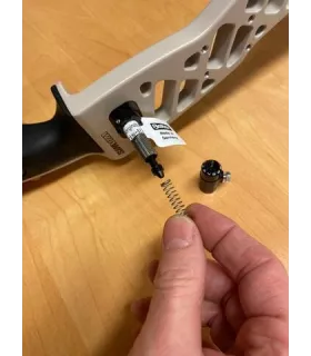 Installation d'un berger button sur un arc classique