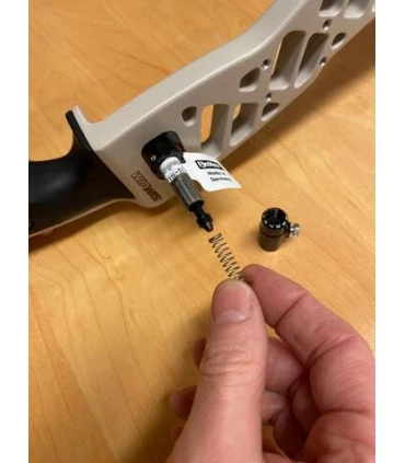 Installation d'un berger button sur un arc classique